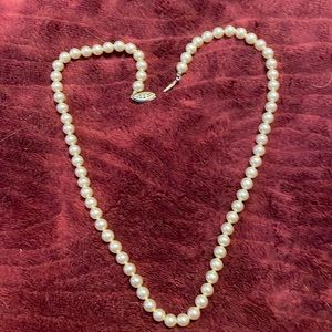 Faux pearls with lovely sheen  approx. 19"(see pic.)